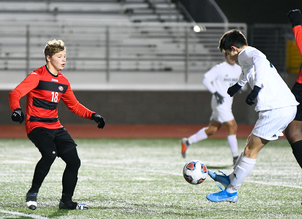 From left, Jefferson City defender and midfielder Will Kuster attempt to defend against Rock Bridge forward Lucas Godon in a game against the Jefferson City Jays Thursday